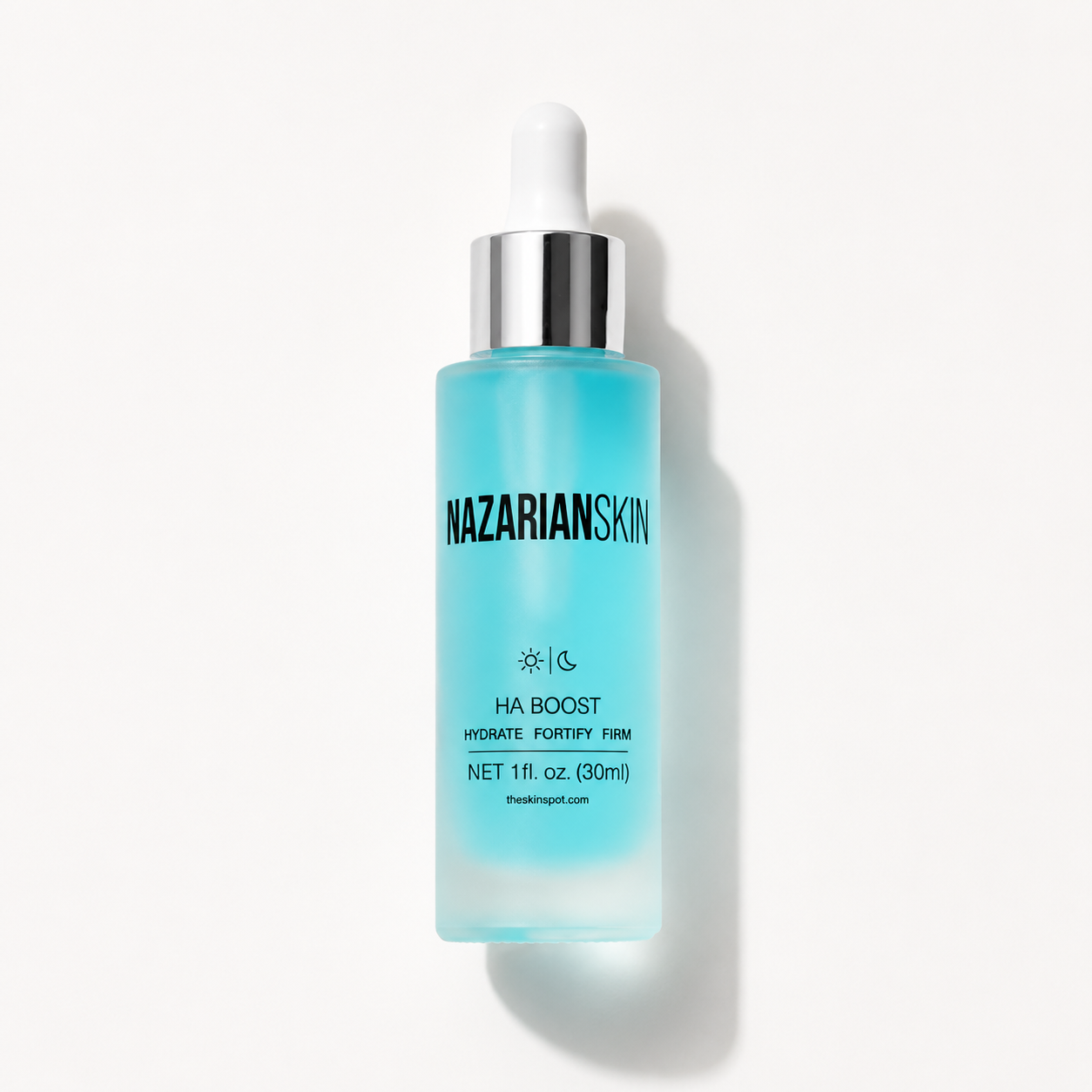 Blue skincare bottle with silver cap on a white background
