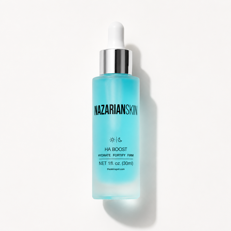 Blue skincare bottle with silver cap on a white background