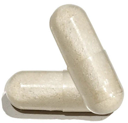 Two beige capsules on a white background