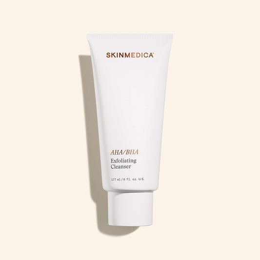 SkinMedica AHA/BHA Exfoliating Cleanser tube on a beige background