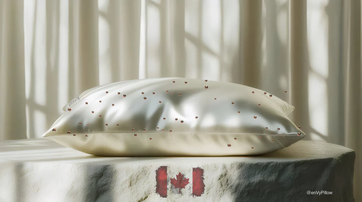 enVy copper pillowcase mulberry silk displayed in luxury setting supporting skin hydration and reducing sleep wrinkles