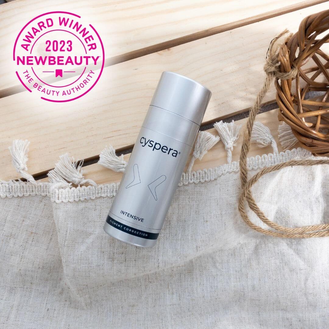 Cyspera Intensive 7 lifestyle photo with 2023 NewBeauty award badge and 7% cysteamine pigment correction for dark spots care