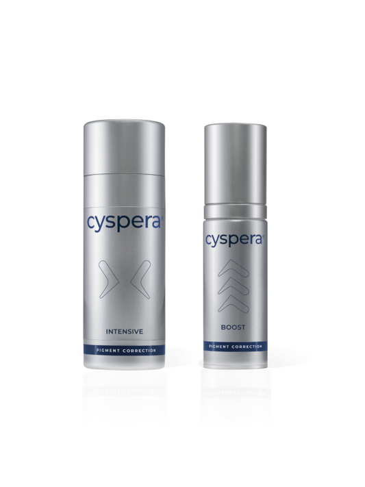 Two silver Cyspera skincare bottles on a white background