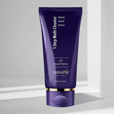 DefenAge 1-Step Multi Cleanse purple tube with natural prebiotics for hydrating, dissolving makeup and balancing skin daily.