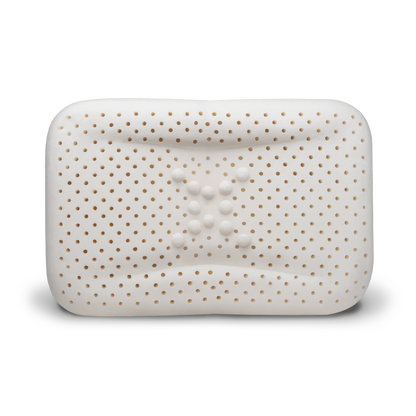 Close-up of enVy ergonomic pillow 100% natural latex core showing ventilation holes and dual-density neck support bumps