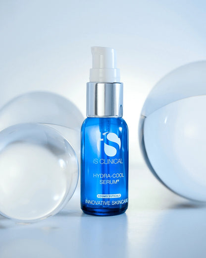 iS Clinical Hydra-Cool Serum bottle with glass spheres for cooling face serum, hydration and calming skin support daily use.