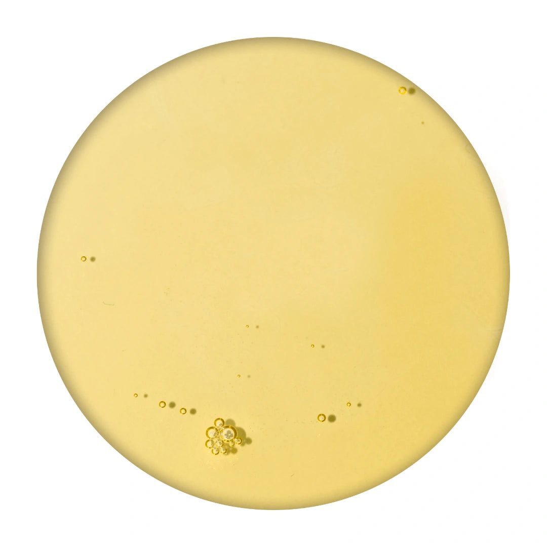 Lumity facial oil texture swatch showing golden lightweight anti-aging oil for smooth hydrated glowing skin and daily care!!