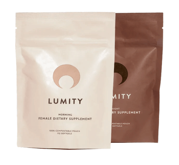 Lumity female dietary supplement morning and night pouches in cream and brown packaging for daily women wellness support use