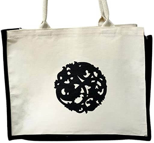 Nazarian Swag cream lined tote bag with black logo detail and structured black trim for daily use.