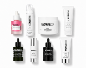 A collection of eight Nazarian Skin skincare products arranged in two rows on a clean white background. The products include a pink dropper bottle, a white pump bottle, a white jar, a white tube, a dark green dropper bottle, a white bottle with a silver cap, a black dropper bottle, and a white tube with a silver cap.

NazarianSkin Acne Regimen with glycolic acid, salicylic acid, retinol, sunscreen, polish, and moisturizer