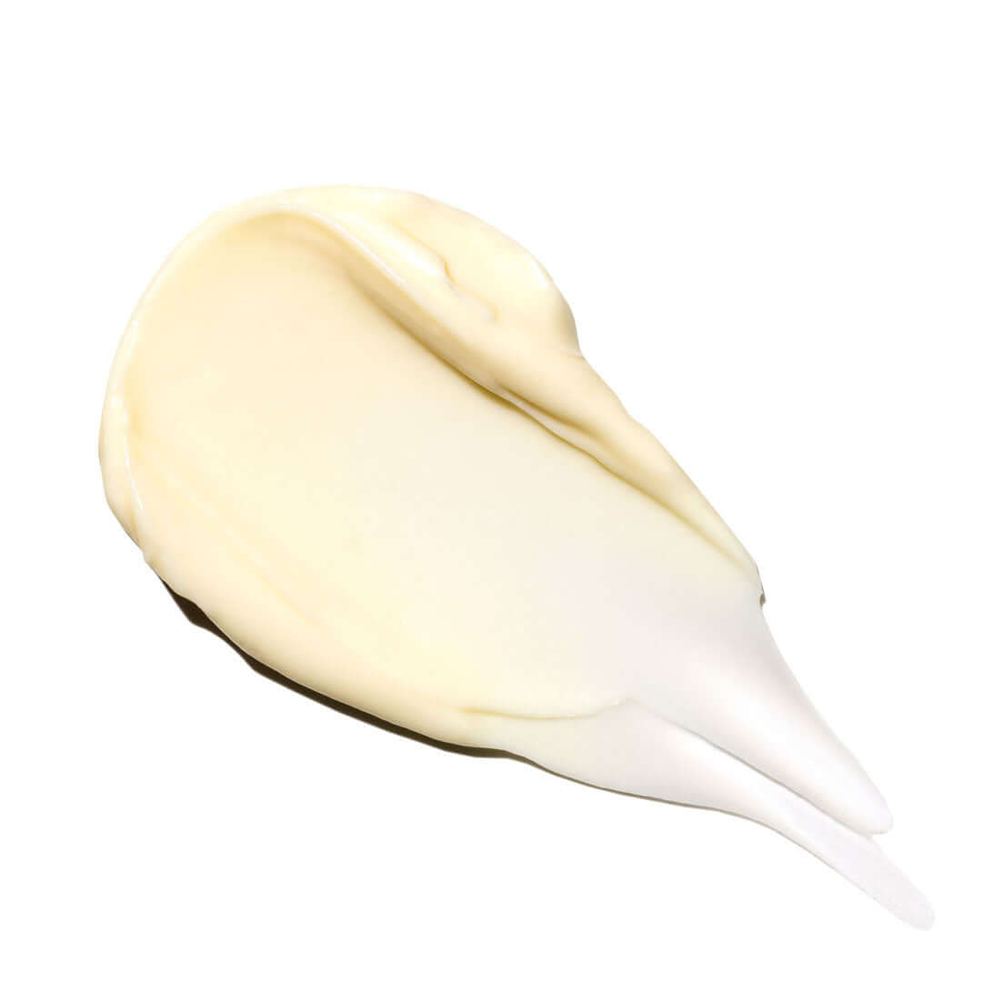 Firming neck cream texture showing rich hydrating formula designed to smooth fine lines and improve neck firmness