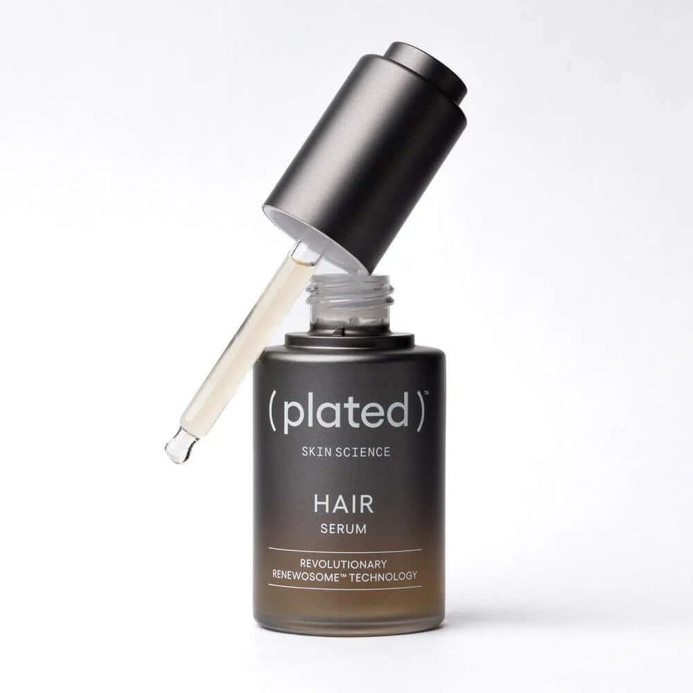 ( plated ) HAIR Serum open dropper shows lightweight scalp formula with Renewosome technology for stronger-looking hair care