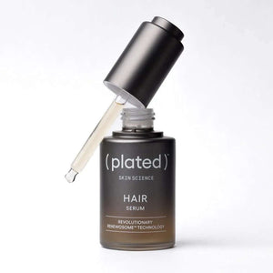( plated ) HAIR Serum open dropper shows lightweight scalp formula with Renewosome technology for stronger-looking hair care