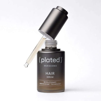 ( plated ) HAIR Serum open dropper shows lightweight scalp formula with Renewosome technology for stronger-looking hair care