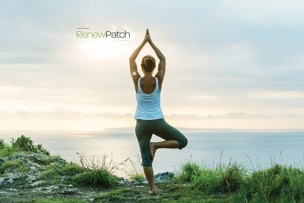RenewPatch topical patch worn on arm during yoga supporting skin renewal and overall wellness routine