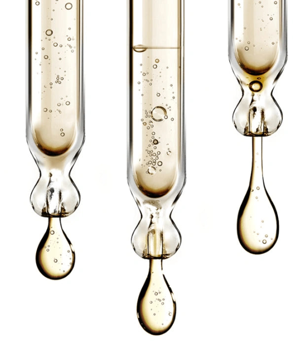 Close up of retinol serum ingredient formula drops showing antioxidant skincare texture used in anti aging facial serum