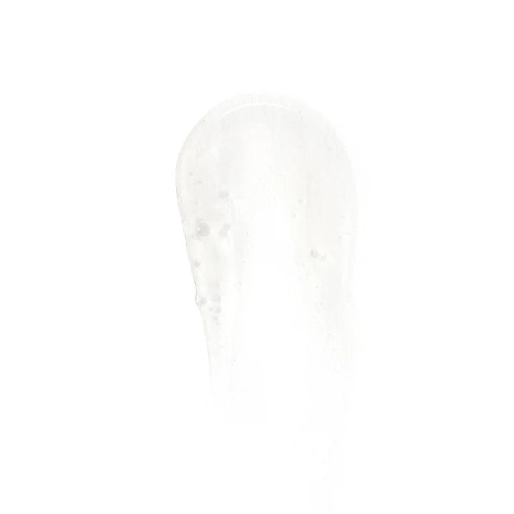 Gel texture of Revision Brightening Facial Wash showing exfoliating cleanser formula that smooths skin and removes impurities