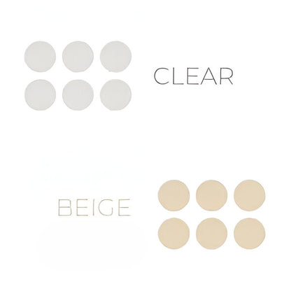 Silagen clear and beige silicone scar dots shown in two sets, six dots each for discreet scar coverage.