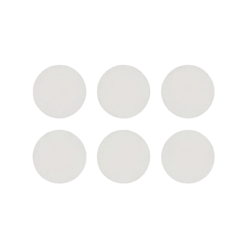 Six Silagen clear silicone dots (1 inch diameter) shown on white background for targeted scar coverage and daily wear.