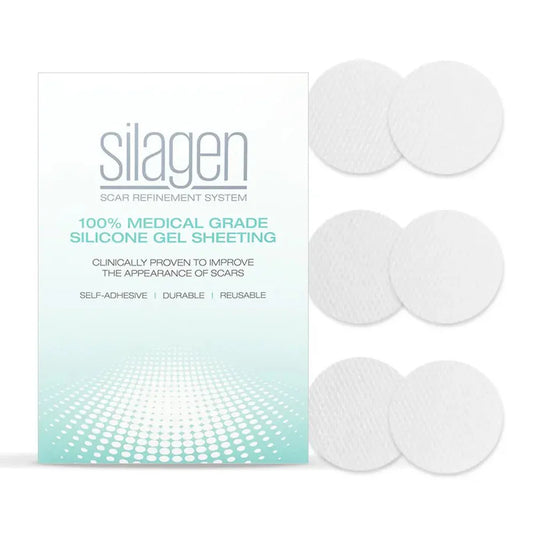 Silagen clear silicone dots (1 inch diameter) shown with box packaging, medical-grade silicone sheets for scar coverage.