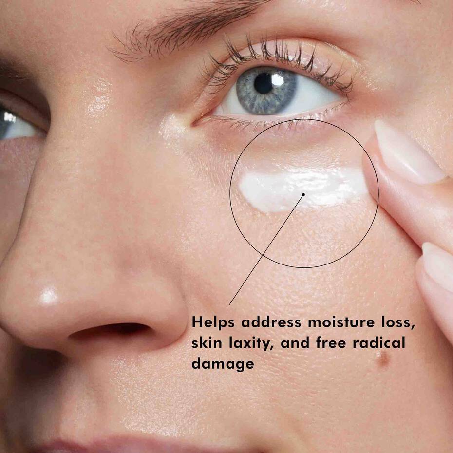 Close-up of SkinCeuticals Eye Balm applied under the eye to help moisture loss, laxity, and free radical damage.