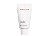 Nutrafol Women's Hair Growth Serum bottle in hand shows ashwagandha exosomes for thicker strands and scalp nourishment today