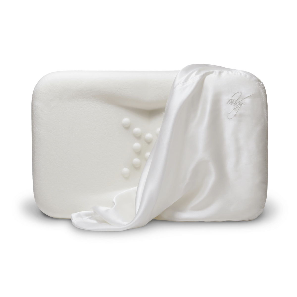 The enVy Copper Silk Pillow image shows organic latex core with white copper silk cover draped over contoured pillow shapes.
