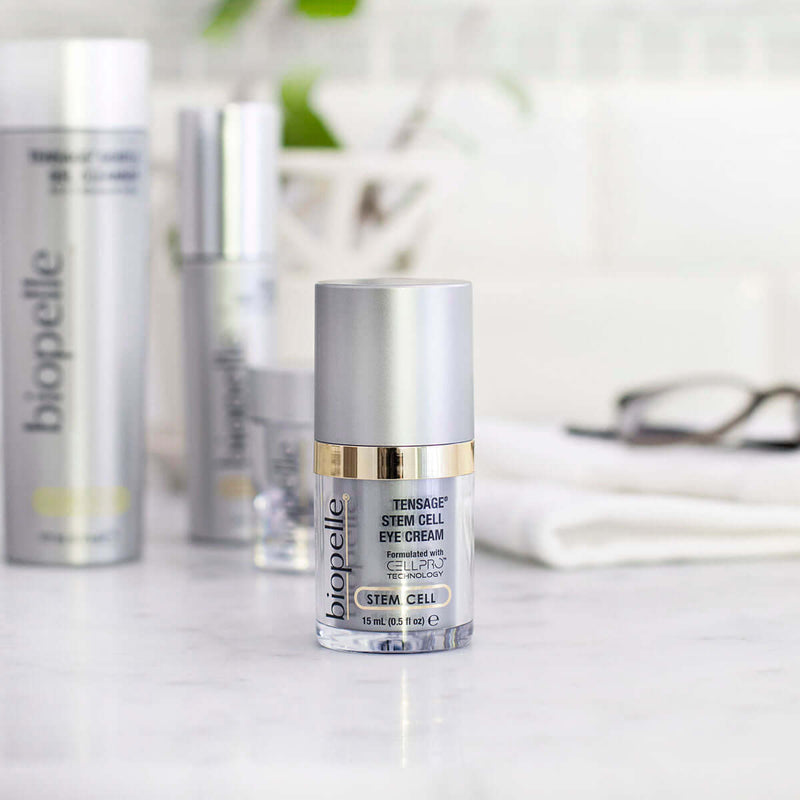 Biopelle Tensage Stem Cell Eye Cream bottle with CellPro, retinol, caffeine on vanity for puffiness and fine lines near eye.