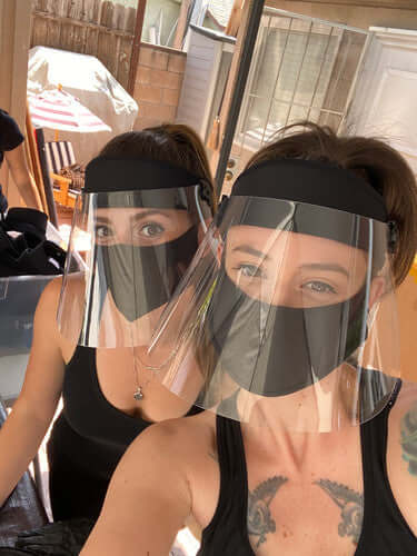 Bluestone hard lens face shield closeup — clear anti-fog polycarbonate lens on black neoprene band