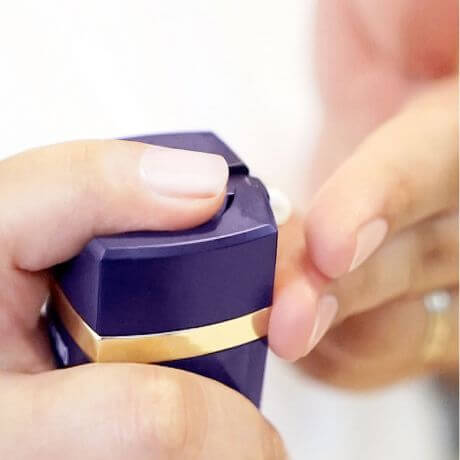 DefenAge 24/7 Barrier Balance Cream pump close-up shows finger pressing dispenser for daily hydrating face cream application