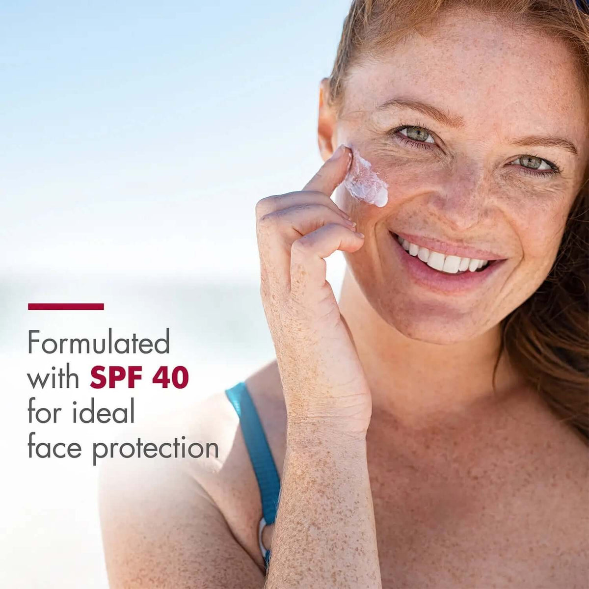 EltaMD UV Daily SPF 40 lifestyle image shows woman applying sunscreen to face for ideal daily SPF facial protection care use