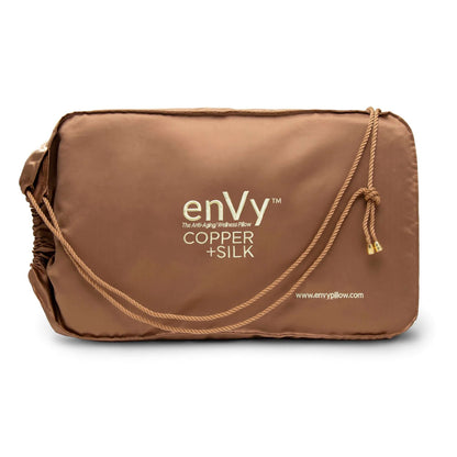 enVy Copper Silk Pillow front — dual neck support organic latex pillow that offloads jaw pressure and prevents sleep wrinkles