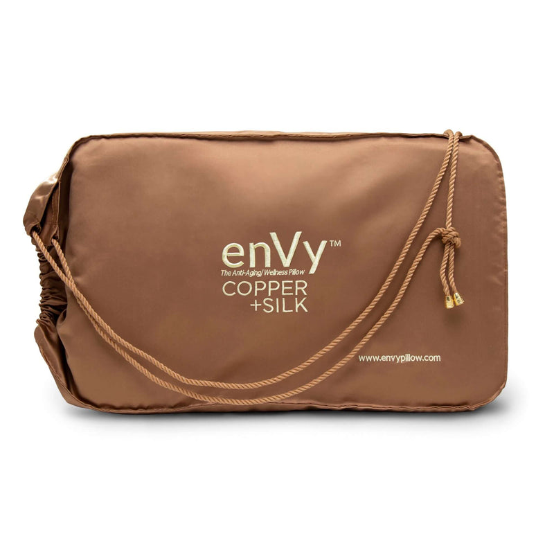enVy Copper Silk Pillow front — dual neck support organic latex pillow that offloads jaw pressure and prevents sleep wrinkles