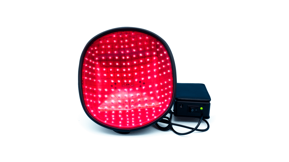 FDA-cleared LaserCap HD Plus device with rechargeable battery pack for convenient hair restoration.