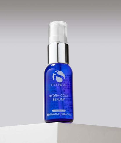iS Clinical Hydra-Cool Serum blue bottle on display ledge for lightweight hydration and calming facial serum care daily use.