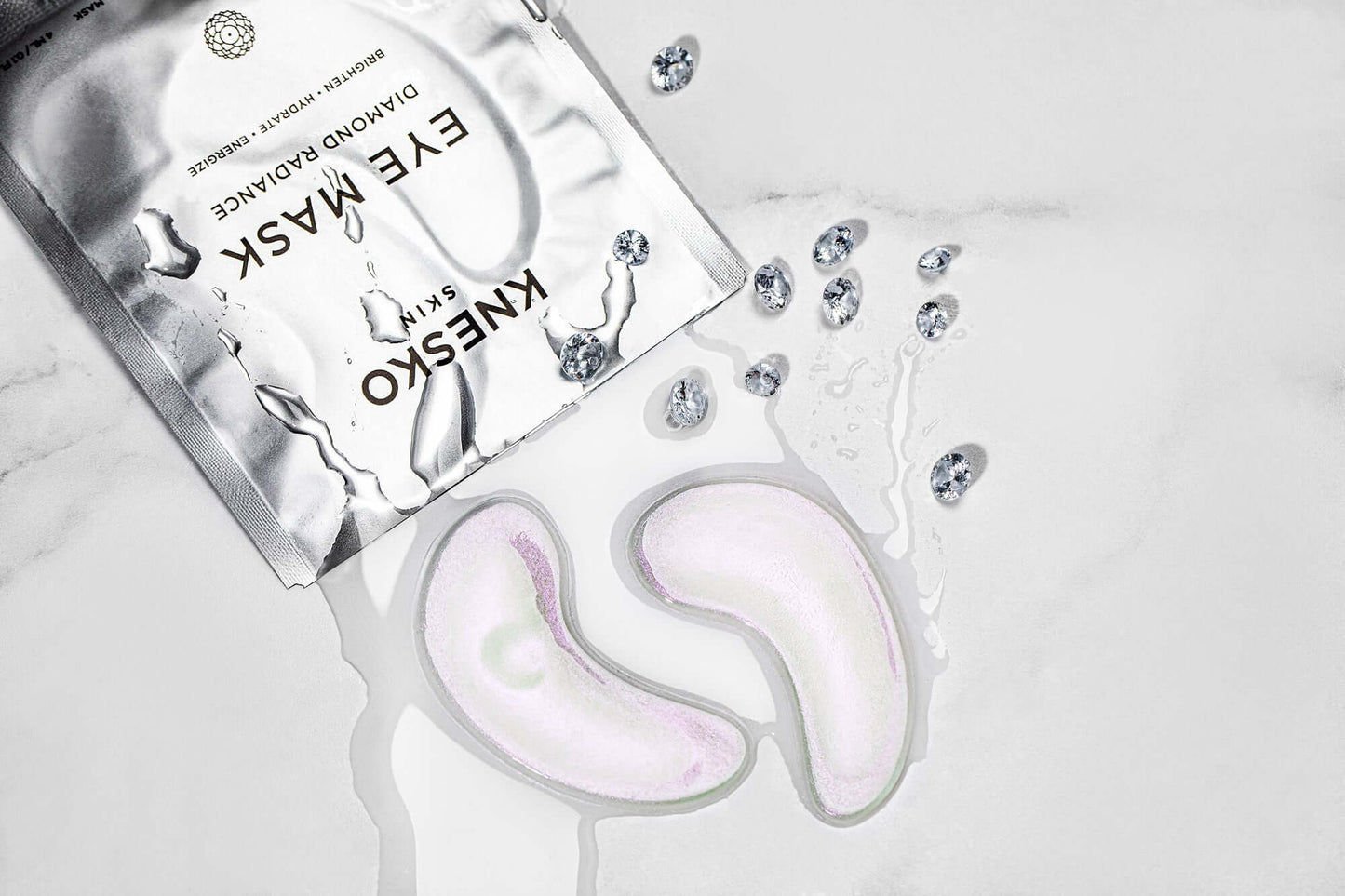Knesko Diamond Radiance Eye Mask with collagen hydrogel patches and diamond detail for bright under eyes