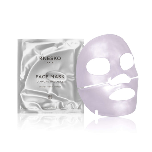 Knesko Diamond Radiance Face Mask with silver pouch and collagen hydrogel mask to brighten, hydrate, and energize dull skin.