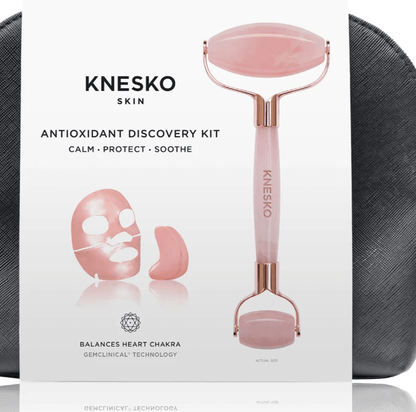 Knesko Skin Travel Kit Antioxidant Discovery Kit with pink facial roller, collagen face and eye masks displayed clearly now.