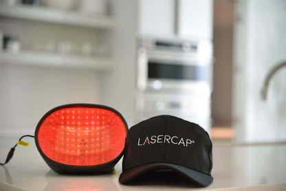 Low level laser therapy (LLLT) diodes inside the LaserCap HD Plus with portable battery pack.