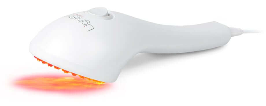 LightStim for Wrinkles LED device angled on skin with red light glow for fine lines and anti-aging facial care in home uses.