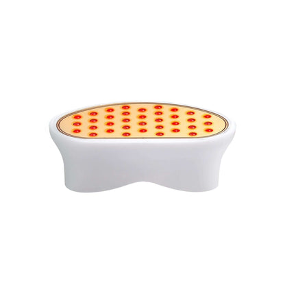 NuFACE Trinity Wrinkle Reducer device on charging cradle with red light attachment for three minute facial wrinkle care home