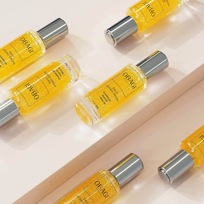 Obagi Daily Hydro-Drops flat lay shows golden facial serum with Vitamin B3 and Hibiscus oil for moisture barrier care uses..