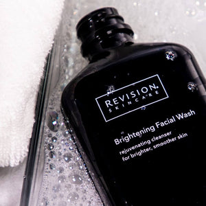 Revision Skincare Brightening Facial Wash gently exfoliates removes impurities and helps reveal smoother clearer radiant skin