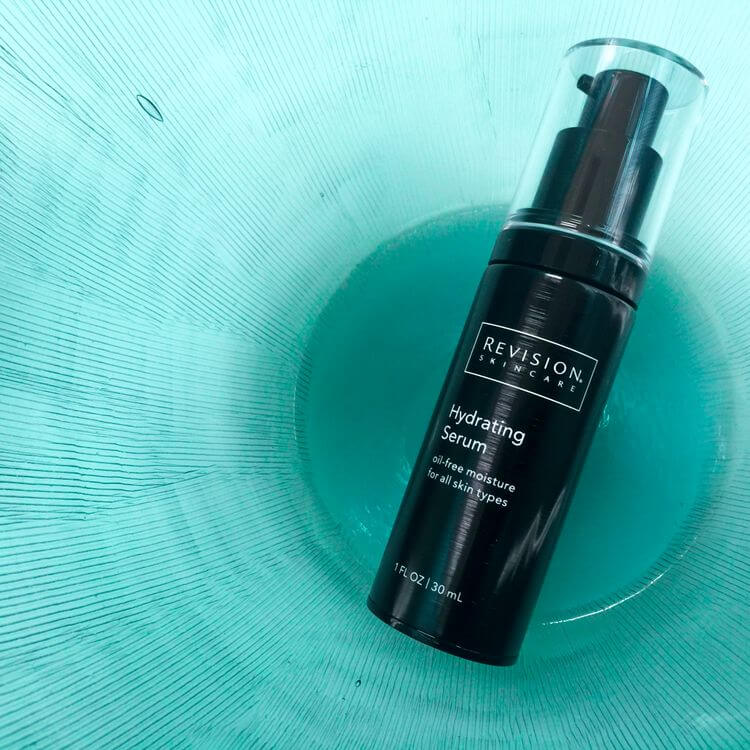 Revision Hydrating Serum shown with recommended usage apply to clean skin twice daily for smooth lightweight hydration daily