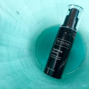 Revision Hydrating Serum shown with recommended usage apply to clean skin twice daily for smooth lightweight hydration daily