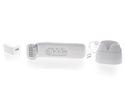 Saian FirmAge Portable RF device laid with charger and cradle for portable face and body toning treatments during travel use