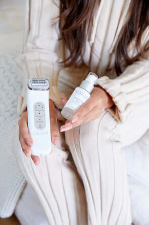 Saian FirmAge Portable RF device shown with serum and creme for non-surgical firming and toning treatments at home care...