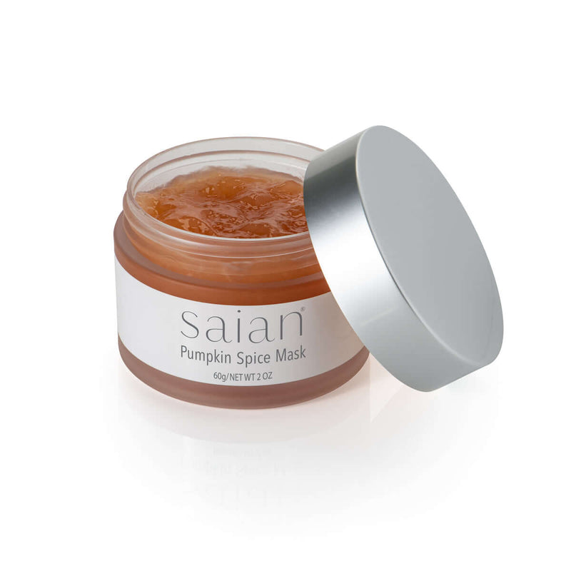 Saian Pumpkin Spice Mask open jar showing orange enzyme mask texture with silver lid for facial exfoliation care.