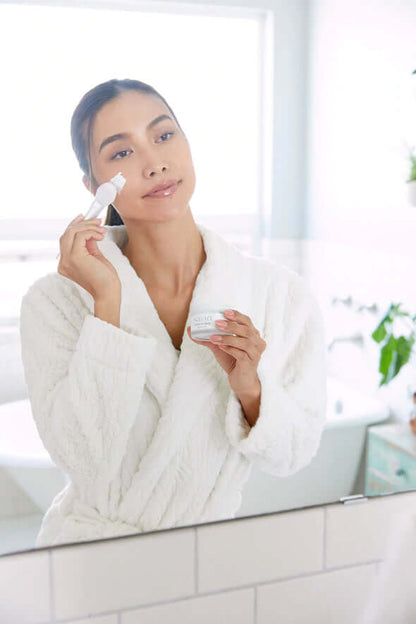 Saian Silicone Applicator Spatula Trio helps apply a facial mask around cheeks for a clean at-home spa routine.