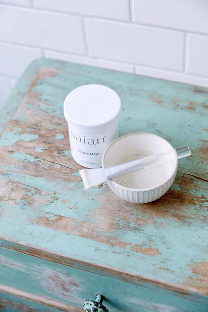 Saian Silicone Applicator Spatula Trio sits beside enzyme mask and bowl for neat mixing and facial application.